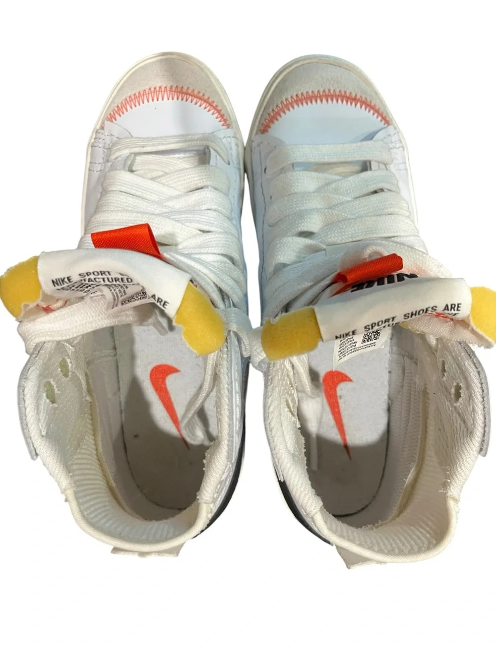 Nike Blazer Mid '77 Jumbo sneakers in a white and orange colorway
